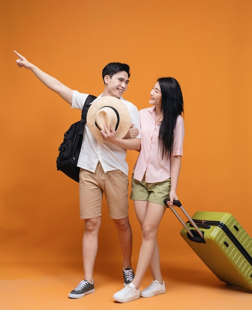 Young Asian couple travel concept background