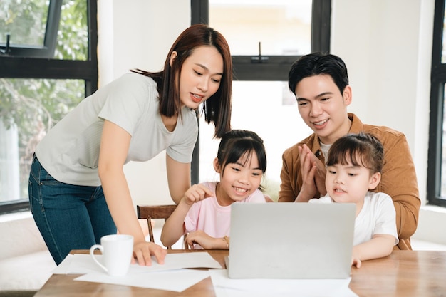 Young Asian family at home