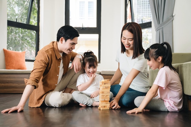 Young Asian family at home