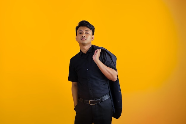 young asian male serious face with background yellow