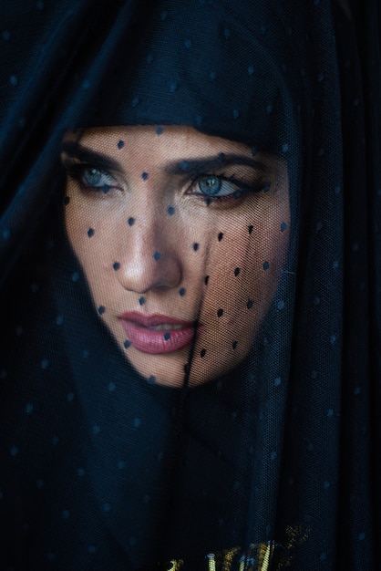 Young asian muslim woman in head scarf smile Beautiful middle eastern woman wearing abaya Arabian