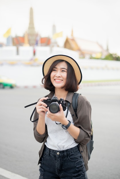 Young Asian travel woman is enjoying with beautiful place in Bangkok, Thailand 