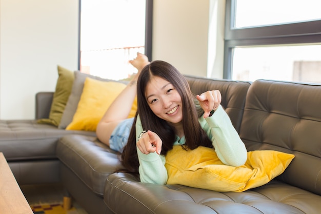 Young asian woman feeling happy and confident