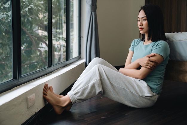 Young Asian woman at home