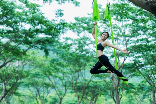 Young Asian woman practicing yoga together