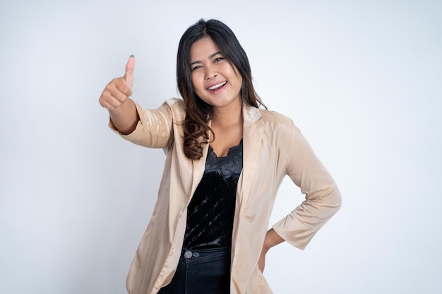 Young asian woman stand with crossed hands on isolated background