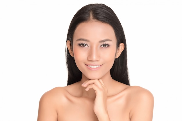 Young Asian woman with beautiful face and clear skin face close up studio