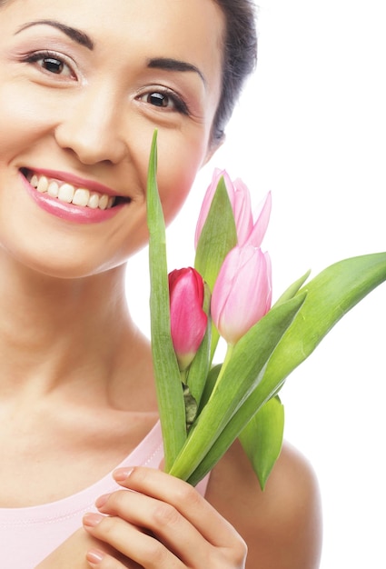 Young asian woman with tulips