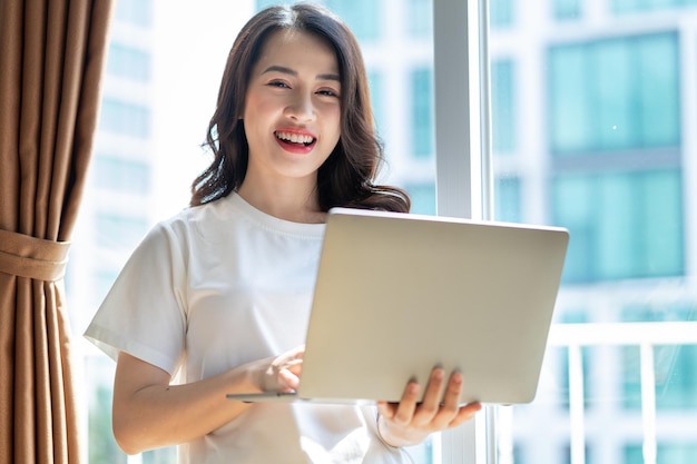 Young Asian woman working at home