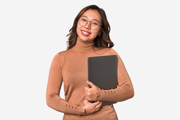 A young asian woman working with her laptop