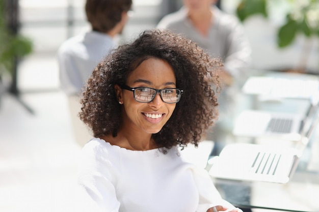 Young attractive african american woman in the office