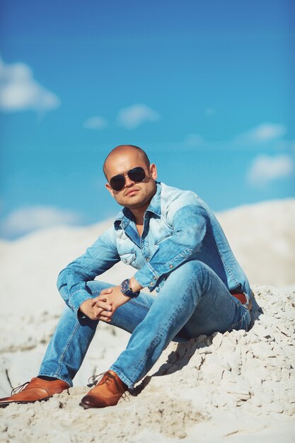 Young Attractive Man Relaxing at the Beach