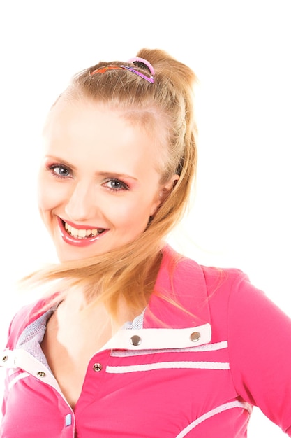 Young attractive woman in pink on white background