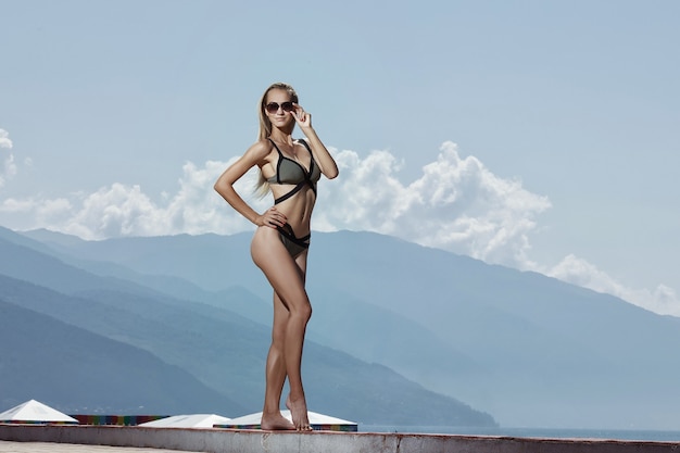 Young attractive woman in a swimsuit