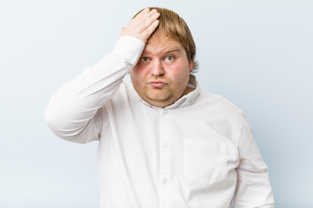 Young authentic redhead fat man being shocked, she has remembered important meeting.