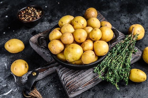 Young baby Potatoes in a pan