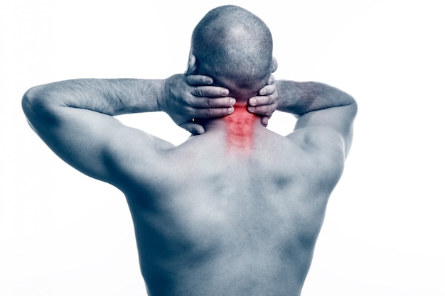 Young bald man sportive physique stretched neck