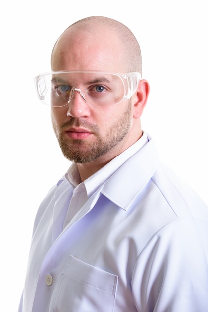 Photo young bald muscular man doctor