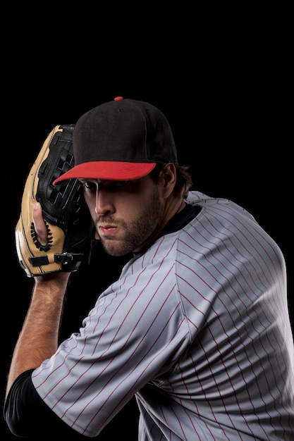 Young baseball player with a black cap