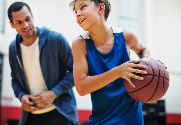 Young basketball player shoot