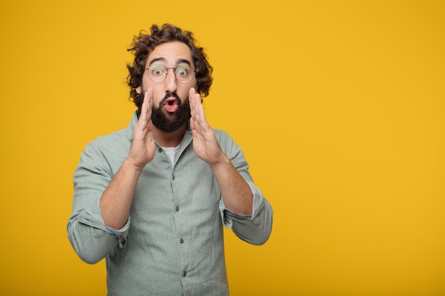 Young bearded businessman expressing a concept 