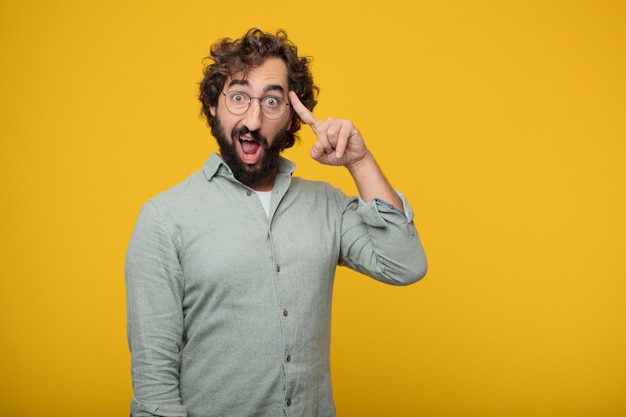 Young bearded businessman expressing a concept 