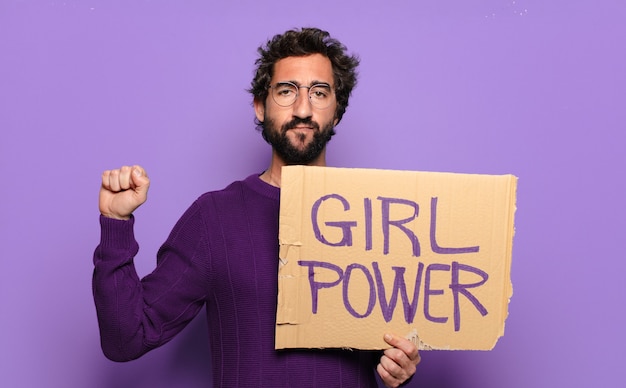 Photo young bearded man girl power concept