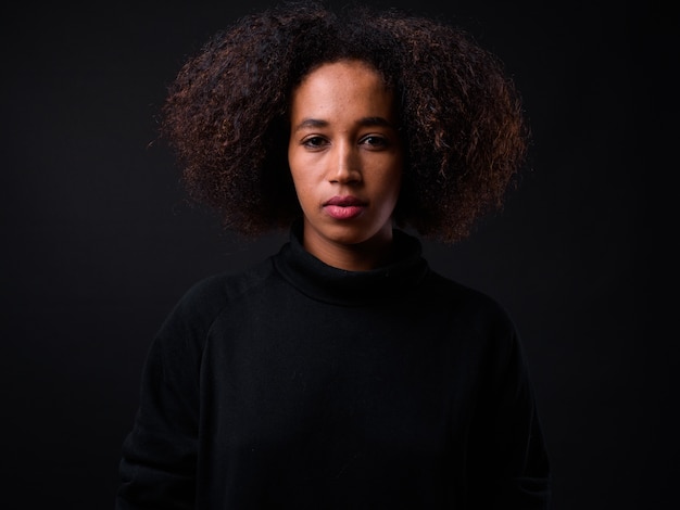 young beautiful African woman with Afro hair black