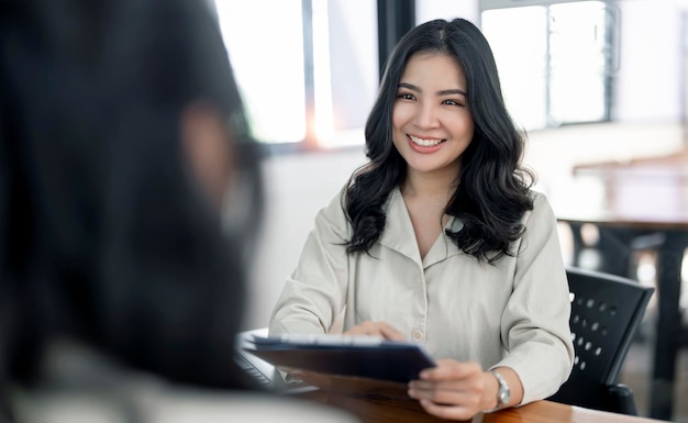 Young beautiful asian woman doing a job interview