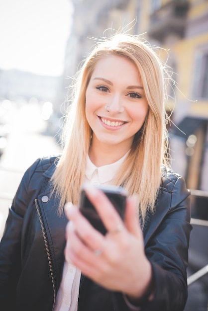 young beautiful blonde straight hair woman