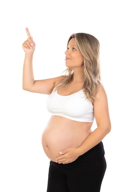 Young beautiful blonde woman pregnant expecting baby over isolated white background with a happy and cool smile on face