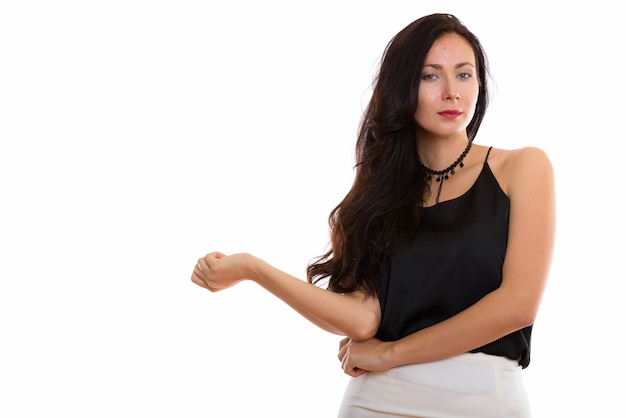 young beautiful businesswoman with arm resting on waist