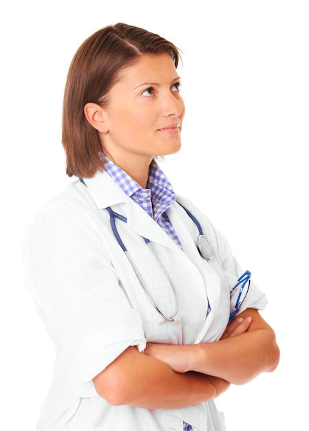 a young beautiful doctor with stethoscope smiling over white