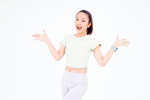 Young beautiful girl wearing yoga exercise casual clothes pointing finger up with successful idea exited and happy expression Finger gesture lady over isolated background