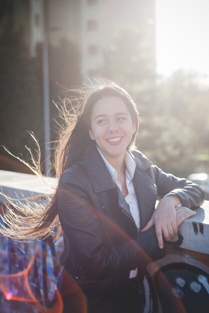 young beautiful long hair woman in town