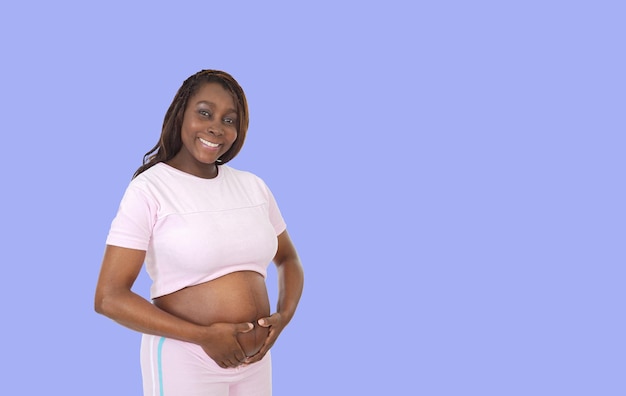 Young beautiful pregnant african woman