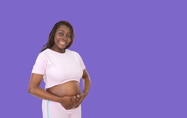 Young beautiful pregnant african woman