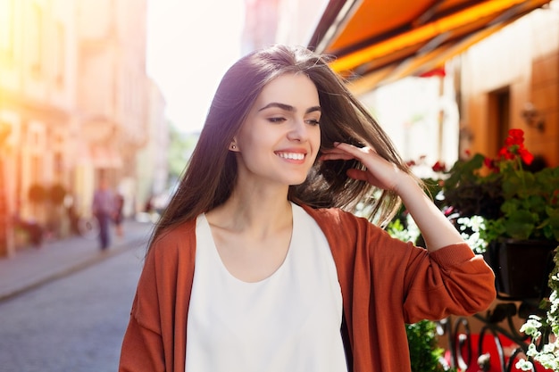 Young beautiful stylish woman walking