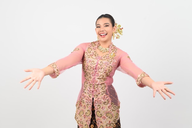 Young beautiful woman dress up in local culture in southern region smile with happy