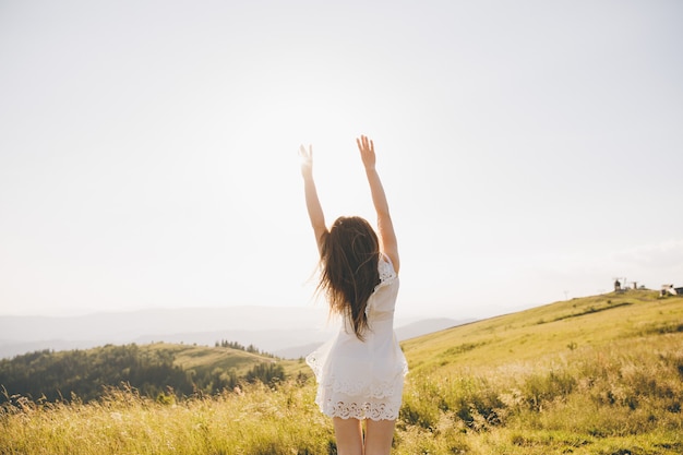 Young beautiful woman having fun outside nature