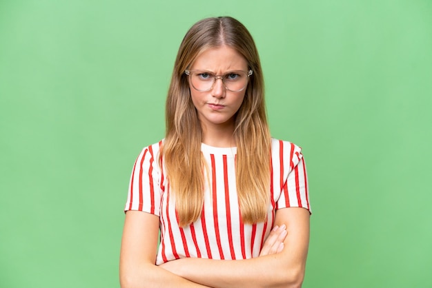 Young beautiful woman over isolated background feeling upset