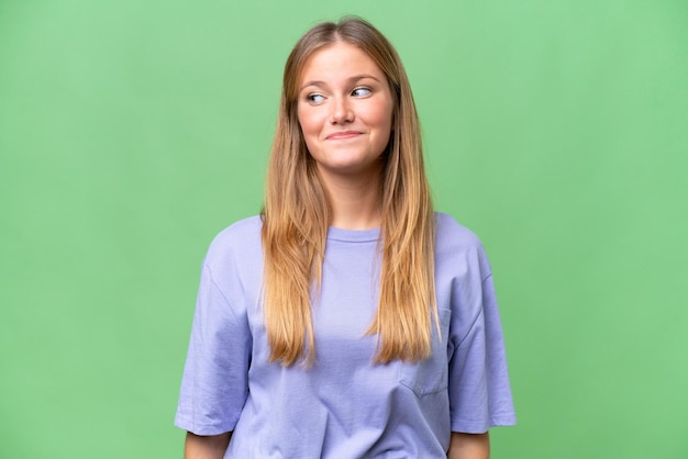 Young beautiful woman over isolated background making doubts gesture looking side