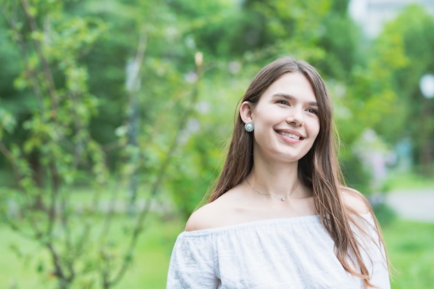 Young beautiful woman wearing a white shirt