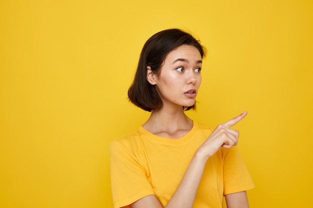 Young beautiful woman in yellow tshirt posing fashion Lifestyle unaltered