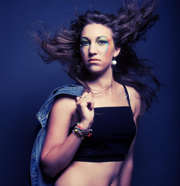 Young beauty woman posing in studio