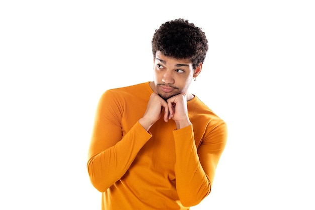 Young black afro man thinking, feeling doubtful and confused isolated