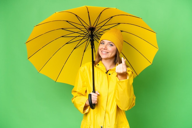 Young blonde woman over isolated background