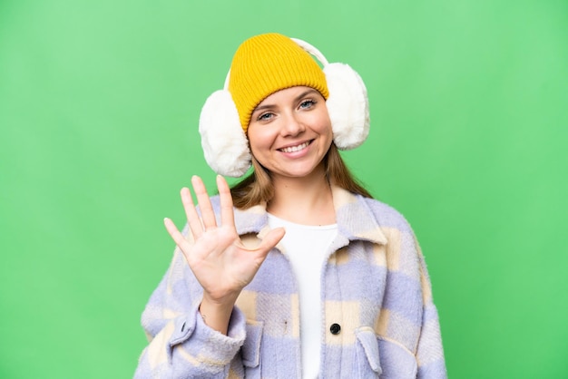 Young blonde woman over isolated background