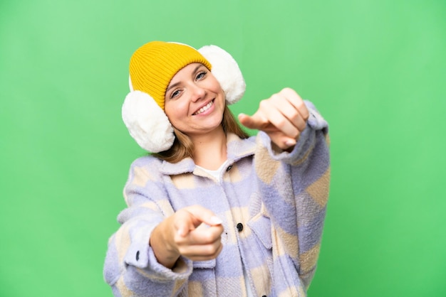 Young blonde woman over isolated background