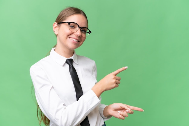 Young blonde woman over isolated background